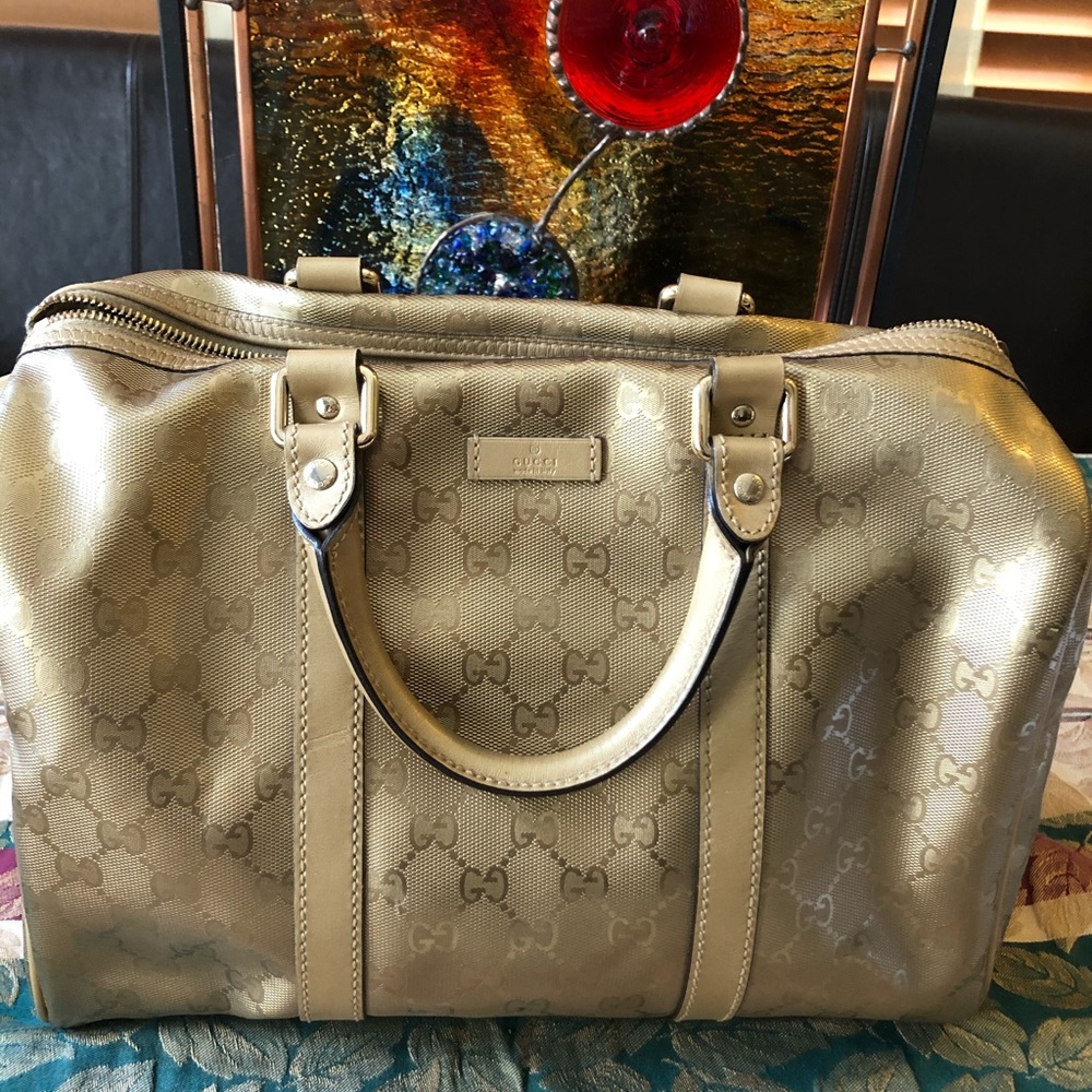 Luscious gold Gucci bag perfect condition